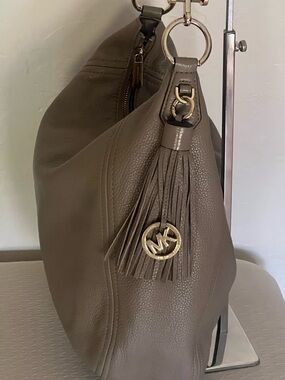 Michael Kors Taupe Soft Pebbled Leather Tassel Hobo with Gold Hardware
